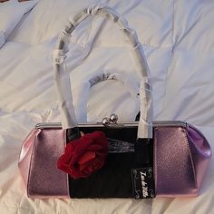 Never Used, With Cover Bag And Removable Rose. Very Pretty Pink, This Is A Larger Handbag. 16" W X 7" H. Pink Evening Satchel, Pink Satchel With Removable Pouch For Evening, Pink Evening Satchel Bag, Pink Party Satchel Shoulder Bag, Pink Clutch Bag With Handles, Pink Clutch Shoulder Bag, Pink Clutch Shoulder Bag With Handles, Pink Party Satchel With Removable Pouch, Pink Shoulder Bag With Top Carry Handle For Party