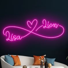 a living room with a white couch and purple neon sign that reads, usa lion