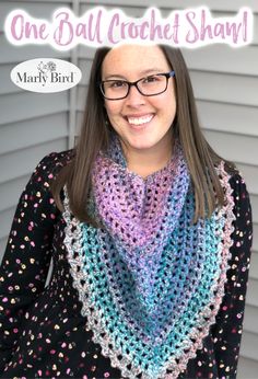 a woman wearing glasses and a crochet shawl with the text, one ball crochet shawl