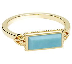 Incorporate timeless style into your accessorized look with this statement ring showcasing a rectangular turquoise gemstone. From Elyse Ryan. Rectangle Turquoise Ring, Elegant Turquoise Jewelry With Rectangular Stone, Elegant Rectangular Turquoise Ring, 14k Gold Turquoise Gemstone Ring, Gold Turquoise Ring With Large Stone As Gift, Elegant Turquoise Rectangular Stone Jewelry, Yellow Gold Turquoise Ring With Polished Finish, Rectangular Blue Turquoise Gemstone Ring, Turquoise Gemstone