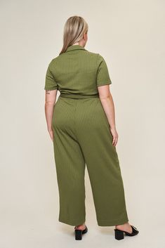 The "Lucia" jumpsuit is going to be your most-repeated piece ever. We're calling it. This jumpsuit is sewn in a high-quality knit rib that has a balance of stretch and sturdiness - making it perfect for a comfortable, yet tailored look. When creating this jumpsuit, we decided to use a long, exposed zipper to add some character, as well as include a working belt + loops for added waist definition. Pair this jumpsuit with sneakers for work and pack your heels to take it from the office to happy ho Jumpsuit With Sneakers, Sneakers For Work, Belted Jumpsuit, Belt Jumpsuit, Long Jumpsuits, Exposed Zipper, Green Pattern, Gold Zipper, Spandex Fabric