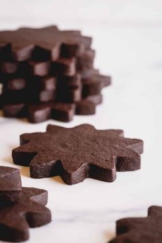 several pieces of chocolate sitting on top of a table