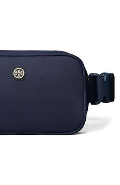 Signature logo hardware and durable nylon distinguish a compact belt bag fitted with an adjustable webbing strap perfect for on-the-go styling. Lined Nylon Imported Tory Burch Navy Blue Bag, Webbing Strap, Royal Navy, Signature Logo, Belt Bag, Tory Burch, Nordstrom, Navy, ? Logo