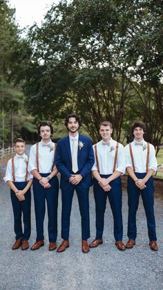 a group of young men standing next to each other