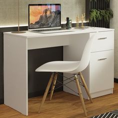 a white desk with a computer on it and a chair in front of the desk