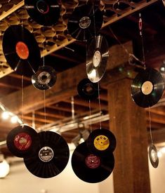 an assortment of records hanging from the ceiling