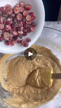 the ingredients are being mixed together to make cranberry orange cake batter in a bowl