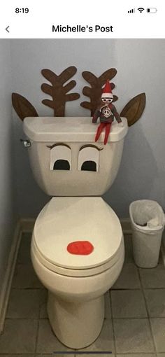 there is a toilet that has been decorated to look like rudolph the reindeer on it