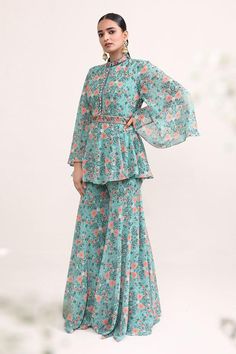 Green peplum style kurta featuring floral print with bead, sequin, and pearl embroidered neckline. Paired with a printed sharara and belt., Fit: Relaxed Kurta And Sharara Set, Printed Sharara, Kurta And Sharara, Printed Embroidery, Peplum Styles, Sharara Set, Embroidered Neckline, Women Kurta, Band Collar