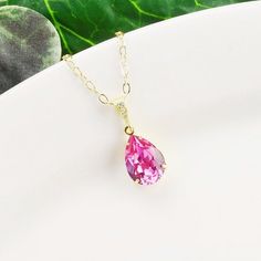 Bright pink necklace featuring a rose swarovski crystal teardrop in a 24kt gold plated prong setting attached to a cubic zirconia gold plated bail on a 14 kt gold filled chain.  The swarovski necklace is a vibrant shade of hot pink.  The perfect crystal necklace for a special occasion and beautiful enough for your bridesmaid jewelry.  The crystal pendant is 1 1/4" long.  The chain is 14 kt gold filled with a lobster claw clasp and 1 1/2" extender chain.Multiples available.  Message me for pricin Bridesmaid Jewelry Gold, Gold Bridesmaid Jewelry, Lexington Nc, Lavender Earrings, Glass Drop Earrings, Celestial Necklace, Etsy Bridesmaid Gifts, Pink Bridal, Swarovski Necklace