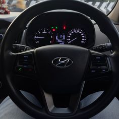 the interior of a car with gauges and dash lights