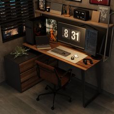 a computer desk with a clock on it