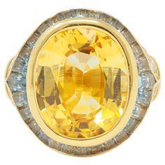 an oval yellow sapphire and diamond ring, by van cleef for cartier