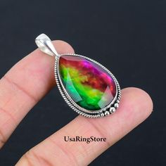 Canadian Ammolite Silver Pendant 925 Sterling Silver Ammolite Gemstone Pendant Silver Jewelry Designer Handmade Pendant Jewelry Gift For Her ITEM DESCRIPTION -  Gemstone : Canadian Ammolite Material : 925 Sterling Silver **About Stone:-** Stone is Natural and every stone have different texture stone will be different what you have seen in picture.   **If You have Problem What to Do??** :- If you have any problem with the order or any inconvenience. Please contact us before opening any case-item not received, item not as described or opening any return. We are requesting please contact on message. We will resolve the issue in 24 Hours or as possible we as can. Your order will be handmade and ready for shipment in 3 to 5 business days Normally we ship via UPS it takes 3 to 4 weeks if you nee Texture Stone, Pendant Silver, Jewelry Designer, Handmade Pendant, Handmade Pendants, Gemstone Pendant, Jewelry Gift, Pendant Jewelry, Silver Pendant