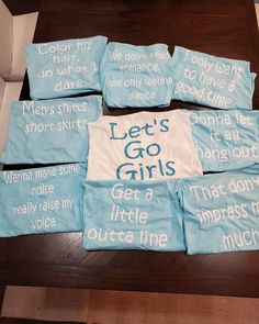 six blue t - shirts that say let's go girls and have words on them