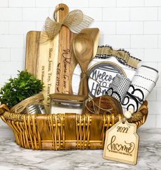 a basket filled with wooden utensils and other kitchen items on a counter top