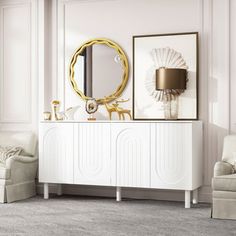 a living room with white furniture and gold accents