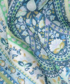 This lightweight, linen-blend wrap features an intricate, watercolor-inspired print that's modern-yet-timeless, and ready for sunshine. Dimensions: 27 in. x 72 in.Materials: 85% Modal, 15% Linen Bohemian Patterned Scarves For Spring, Patterned Bohemian Scarves For Spring, Spring Floral Print Patterned Scarf, Bohemian Printed Patterned Scarves, Blue Bohemian Scarves With Floral Print, Bohemian Printed Scarves For Spring, Summer Floral Print Patterned Scarves, Summer Blue Floral Print Scarves, Bohemian Linen Scarves For Spring