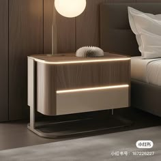 a night stand with a lamp on it next to a bed