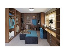 a walk in closet with blue and black furniture