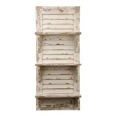 an old white wooden shelf with shutters on the top and bottom, against a white background