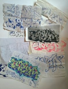 several different types of graffiti written on paper