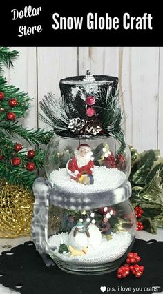 three snow globes are stacked on top of each other