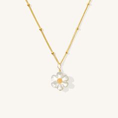 Our adorable Daisy Necklace is right on trend and perfect for floral lovers! The Daisy Necklace is an eye-catcher, featuring a darling daisy made of Mother of Pearl. We love it layered with other dainty necklaces like our Dainty Tag Necklace. DETAILS 14k gold filled 16" satellite chain, clasp, & findings 10mm Mother of Pearl daisy charm Necklace length: 16" with 2" extender Safe for sensitive skin & shower safe Matching earrings: Daisy Hoop Earrings Printable Ring Sizer, Dainty Necklaces, Daisy Charm, Daisy Necklace, Favorite Rings, Dainty Necklace, Gold Filled Chain, Tag Necklace, Necklace Length