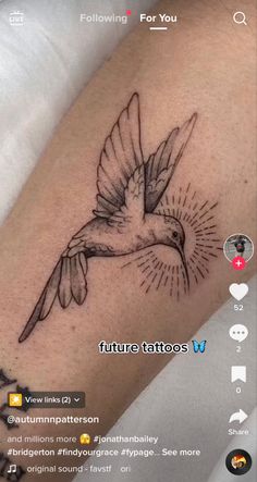 a bird tattoo on the arm that reads future tattoos with an image of a bird flying above it