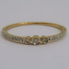 vintage yellow gold size 8 USA diamonds stackable band width 1.3mm at its thinnest point 2.8mm at its widest point weight: 1 gram Stackable Rings With Diamond Accents, Yellow Gold Stackable Rings With Diamond Accents, Dainty Stackable Rings With Diamond Accents, Formal Stackable Rings With Rose Cut Diamonds, Gold Eternity Band With Diamond Accents, Gold Stackable Rings With Rose Cut Diamonds, Dainty Yellow Gold Stackable Rings With Diamond Accents, Ruby Bands, Dream Catcher Earrings