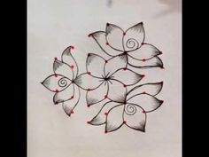 a drawing of flowers with red dots in the middle