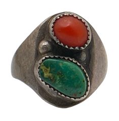 This ring is southwestern style with turquoise and coral. It is tarnished.  The colors of the turquoise and reddish-orange coral are vibrant. A lovely ring.  Traveling the southwest, this little gem was found. I have not yet come across a duplicate of this ring.   Size 6 Turquoise Stone:  Width 0.23" Length: 0.38"  Coral Stone: Width  0.25" Length 0.69  Base: Width: 0.53 Length: 0.70" Shoulder: 0.43"  Band Thickness: 1.2mm  Band Width: 3.3mm Turquoise And Coral, Reddish Orange, Orange Coral, Coral Stone, Southwestern Style, Lovely Ring, Turquoise Stone, Bronx, Rings Statement