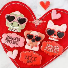 heart shaped cookies in the shape of dogs with sunglasses on them and words that say i love you so much