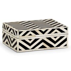 a black and white box sitting on top of a table