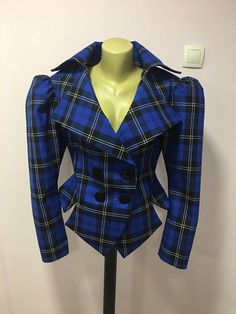 This is a very stylish and elegant jacket . Leght  58cm - at back. Fully lined. A jacket especially made to turn heads and give you that wow factor :) Vintage style leg o mutton sleeves.SIZE CHARTSIZE S - US 6, UK 8, EU 36bust: bust around 34.5”/90cmWaist: waist around 27.5”/70cmHips: hips around 34.5”/90cmSIZE M - US 8, UK 10, EU 38bust: bust around 37.5”/95cmWaist: waist around 29.5”/75cmHips: hips around 37.5”/95cmSIZE L - US 10, UK 12, EU 40bust: bust around 39.5"/100cmWaist: waist around 31 Leg O Mutton Sleeve, Steampunk Lady, Mutton Sleeve, Tartan Coat, Leg Of Mutton Sleeve, Black Watch Tartan, Elegant Jacket, Ladies Blazer, Womens Blazers