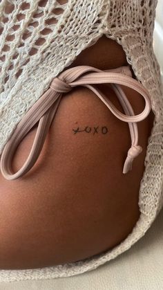 Tattoo   • XOXO Tattoo On Inner Thigh, Small Tattoo Ideas On Hip, Hip Dainty Tattoo, Above Hip Tattoos Women, Small Pelvis Tattoo, Xoxo Tattoo Small Hip, Pantie Line Tattoo, Dainty Tattoos Hip, Xoxo Tattoo Fonts