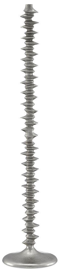 a tall metal object with many spikes on it