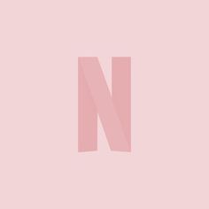 the letter n is made up of pink rectangles on a light pink background