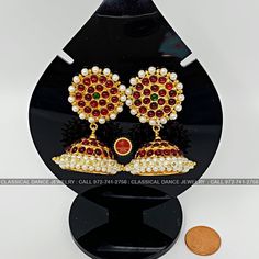 Design by Classical Dance Jewelry® ❥ Colorful and Designer traditional big pearl top and normal butta or jhumka Kemp temple Indian Jewelry Earrings in Red, Green stones combo ❥ Model no: EA-04 ❥ Age : 5 yrs and up ❥ You Can wear this set especially for Bharatnatyam And Kuchipudi Dance Performances and in Parties, Engagement, Weddings, Birthdays. ❥ Handmade Indian Item. Set includes ☛ Earrings pair PLEASE NOTE ❥ ALL SALES ARE FINAL ✅ ❥ No Return/ No Exchange / No Cancellation! ❥ It's handmade ite Round Temple Jewelry Jhumkas For Ceremonial Occasions, Ceremonial Temple Bridal Earrings For Diwali, Ceremonial Diwali Temple Bridal Earrings, Diwali Celebration Temple Bridal Earrings, Temple Jewelry Bridal Earrings With Pearl Drop For Festivals, Festival Puja Jhumkas With Stone Work, Heavy Temple Jewelry Tikka For Celebration, Festive Puja Jhumkas With Stone Work, Temple Jewelry Jhumkas For Festivals And Celebrations