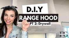 a woman holding up a sign that says diy range hood pt 2 drywall