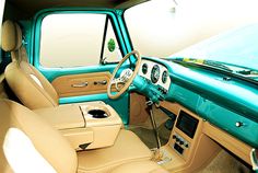 the interior of an old car with leather seats