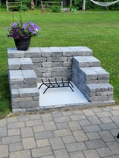 a fire pit made out of cinder blocks