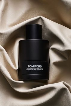 Tom ford ombre leather bottle on crumpled tan leather Mens Perfume Product Photography, Black Theme Product Photography, Cologne Photography Ideas, Perfumes Product Photography, Tom Ford Perfume Photography, Parfume Product Photoshoot Ideas, Cologne Product Photography, Fragrance Photography Ideas, Perfume Product Photography Ideas