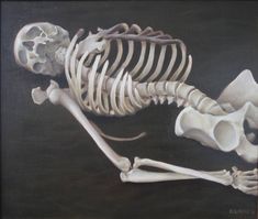 a painting of a skeleton laying on its side