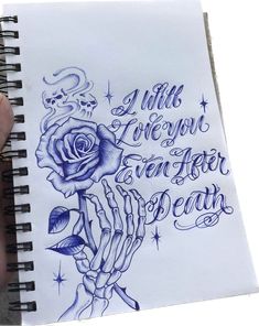 a hand holding a notebook with writing on it and a drawing of a rose in the middle