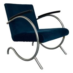 a blue chair with metal legs and arms