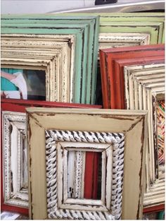 many different colored frames are stacked on top of each other