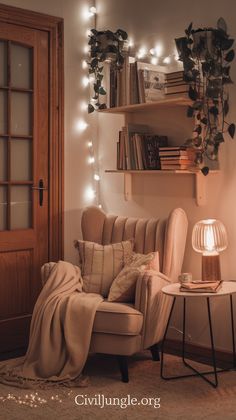 a living room with a chair, lamp and bookshelf filled with books on shelves