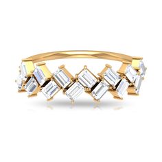 an image of a gold ring with diamonds on the sides and two rows of baguettes