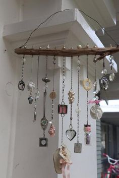 there are many necklaces hanging on the wall